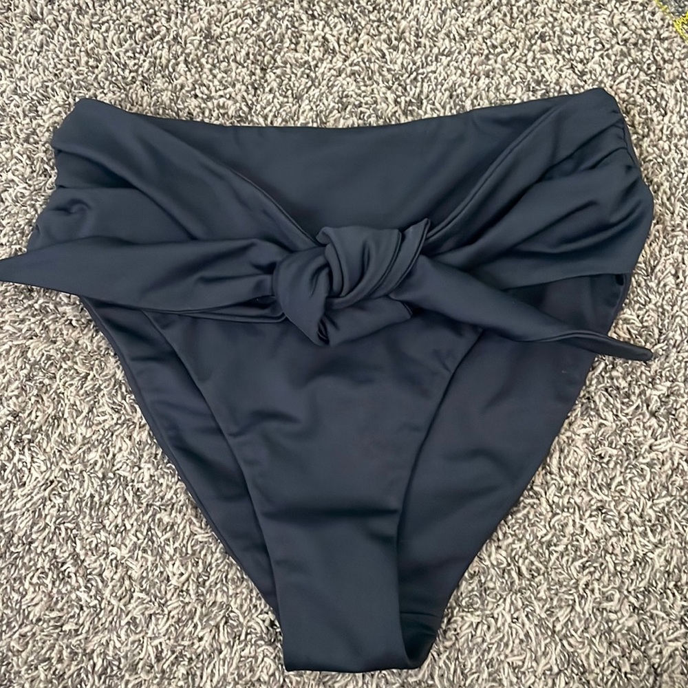 Cleo Harper black swim bottoms with tie size small. Like new